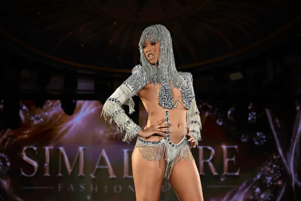 Black Crystals, Metallic Fringe, and Butterfly Motifs