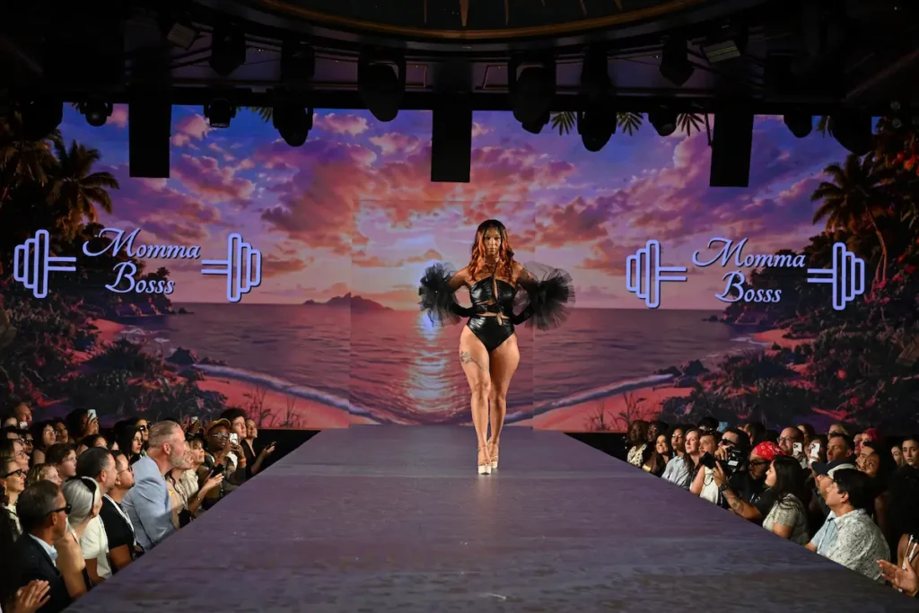Black Swimwear, Sheer Fabrics, and Feathered Wings